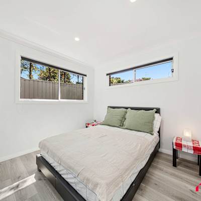 Comfortable bedroom with a with a comfortable
king-sized bed for a restful stay.