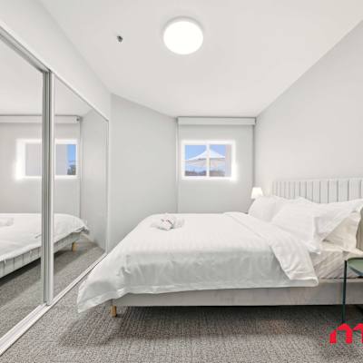 Bright bedroom with large windows