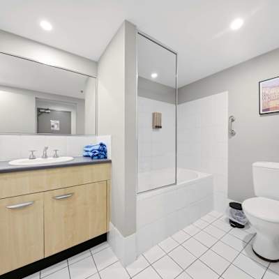 Bathroom with vanity and shower