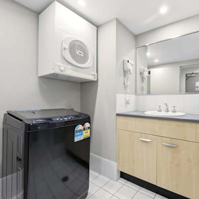 Laundry area with washer