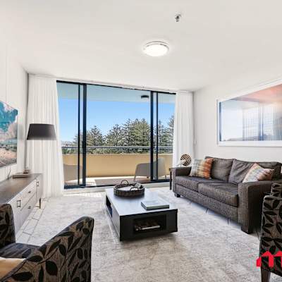 Bright living room with balcony access