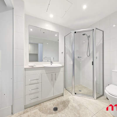 Modern bathroom with shower and vanity