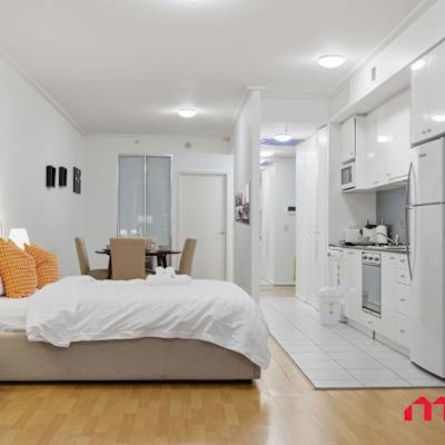 Spacious bedroom with cozy setup