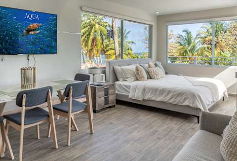 AQUA Terrazas 7 · Beachfront Getaway with King Bed