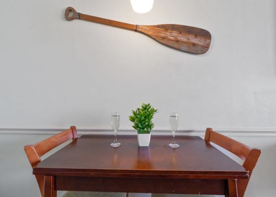 Toast to beach days and breezy nights at this charming dining nook—complete with coastal flair and just enough space for shared laughter, seafood feasts, and that second glass of bubbly.