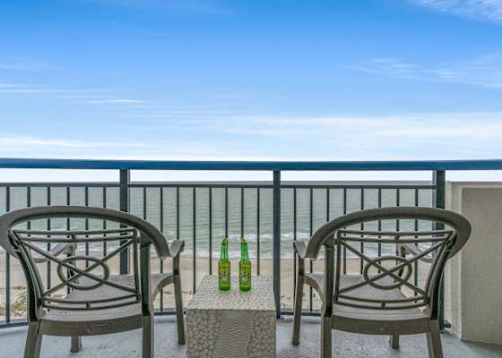 Enjoy stunning ocean views from your private balcony, perfect for relaxing with a drink. 
