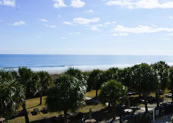 Enjoy unparalleled panoramic oceanfront views from your private balcony.