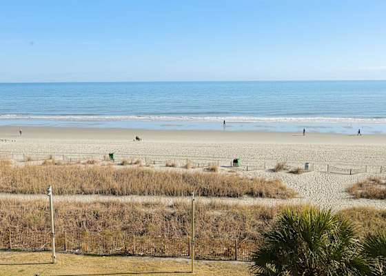 Take in panoramic ocean views from your private balcony, just steps from your bed!