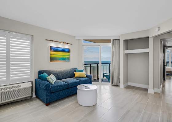 This cozy corner is perfect for unwinding. Step out onto the balcony to feel the sea breeze or relax inside while enjoying scenic views and soothing ambiance.