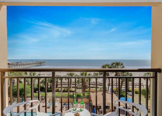 Enjoy stunning ocean views from your private balcony, complete with cozy seating to relax and take in the sights of the beach. Perfect for morning coffee or sunset evenings!