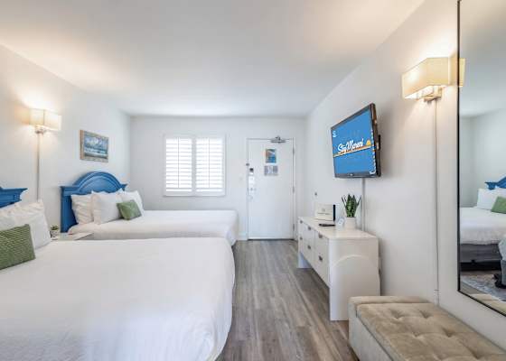 Drift off to sleep in comfort in this inviting bedroom with coastal charm! Featuring two plush beds and soothing decor, it’s perfect for families or friends seeking relaxation. Wake up refreshed and ready to explore your beachside escape!