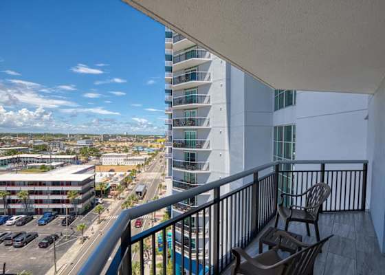 Your private balcony provides a city view—ideal for relaxing with a morning coffee.