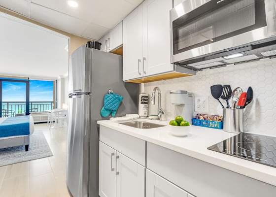 Fully-equipped kitchen with stainless steel appliances, perfect for cooking up a storm. 
