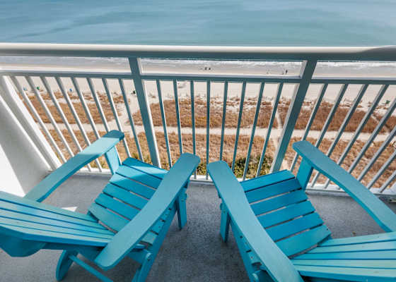 Step onto your private balcony and soak in breathtaking ocean views! Perfect for morning coffee or evening relaxation, this serene space lets you unwind to the sound of waves and the beauty of the beach right at your doorstep.