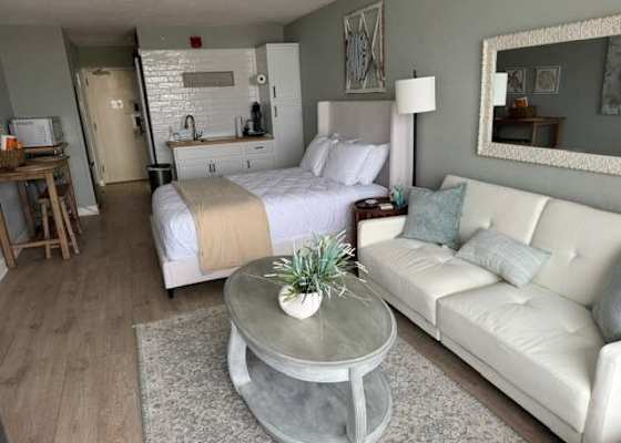 Cozy studio comfort featuring a plush queen bed