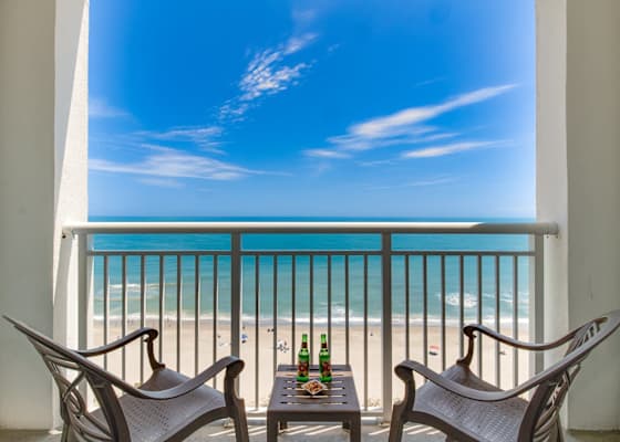 Unwind on your private balcony with uninterrupted ocean views! Enjoy your morning coffee or evening drinks while soaking in the serene beach vibes and the sound of crashing waves. Your perfect seaside retreat awaits!