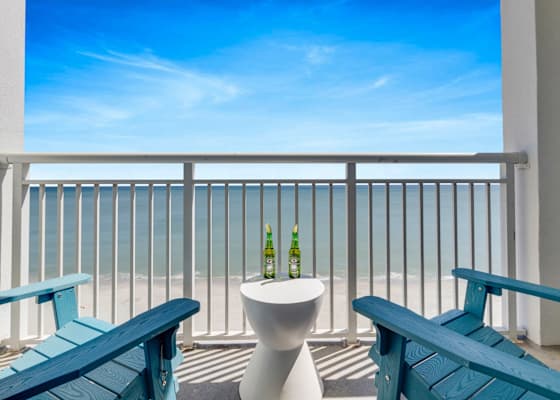Unwind with stunning oceanfront views from your private balcony. Sip a refreshing drink, feel the gentle sea breeze, and let the sound of the waves set the perfect mood for your getaway. 