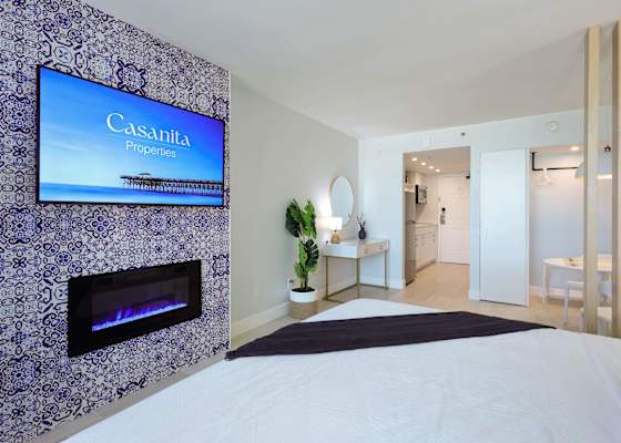 Whether you're streaming a movie or soaking up the ocean view, this bright and airy room offers comfort, entertainment, and coastal charm all in one relaxing space.