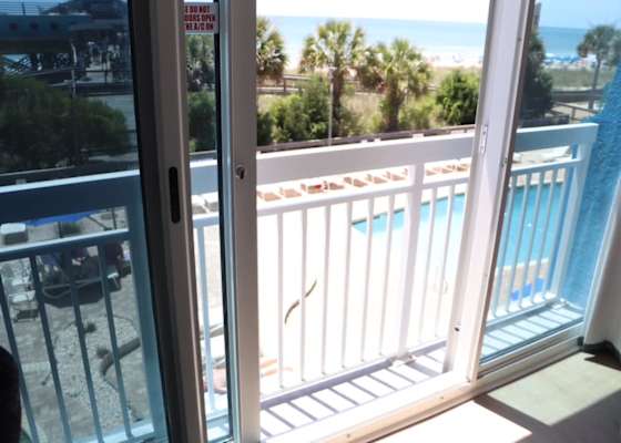 Enjoy beautiful ocean and palm tree views straight from your Juliet balcony!