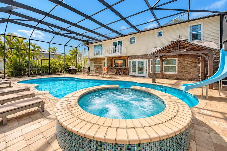 Canal Oasis with Pool Spa Outdoor Kitchen