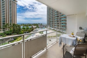 Bright, breezy balcony perfect for outdoor dining with a view