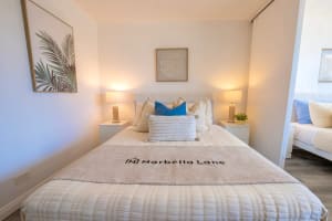 Cozy bedroom with soft lighting and fresh linens