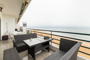 enjoy the balcony overlooking pool and beach