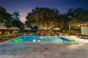 Boho Escape Villa • Canal View | Pickleball Court — El Portal, FL — vacation rental