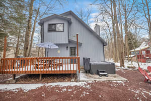 Your ultimate outdoor trifecta – dip into the hot tub, share stories by the firepit, and savor BBQ on the deck