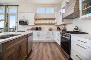 Jump In! NEW Heated Pool & Hot Tub Retreat. Sleeps 13. IMPORTANT: This listing is for ONE private condo unit (Unit C) only. The entire building is NOT included. — Ludington, MI — vacation rental