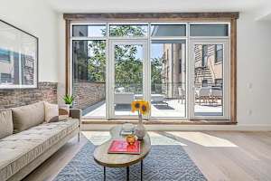 Photo #3 of Library Loft | Modern 2BR Condo with Private Terrace & Gym