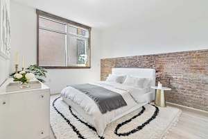 Photo #7 of Library Loft | Modern 2BR Condo with Private Terrace & Gym