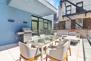 Photo #6 of Library Loft | Modern 2BR Condo with Private Terrace & Gym