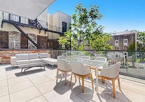 Photo #4 of Library Loft | Modern 2BR Condo with Private Terrace & Gym