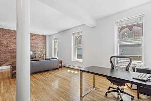 Photo #3 of Seaport Place | Oversized, Sun-Drenched 1BR Loft