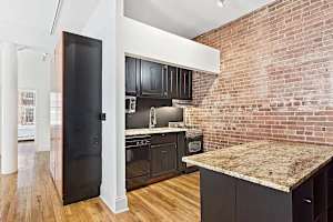 Photo #4 of Seaport Place | Oversized, Sun-Drenched 1BR Loft