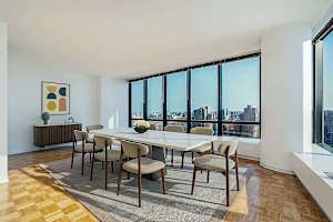 Photo #5 of River Villa | 17th-floor 4BR w/Doorman, Gym, Pool Photo #5 of River Villa | 17th-floor 4BR w/Doorman, Gym, Pool