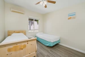 Comfortable bedroom with two cozy beds for guests