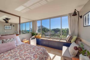 Charming bedroom with outdoor views through the window