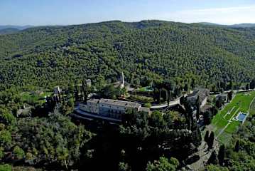 Aerial view of an estate in Tuscany among trees
