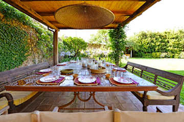 Outdoor dining table with wooden benches