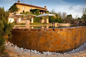 Swimming pool with circular jacuzzi area