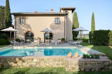 Terrace with sun beds and outdoor sofa