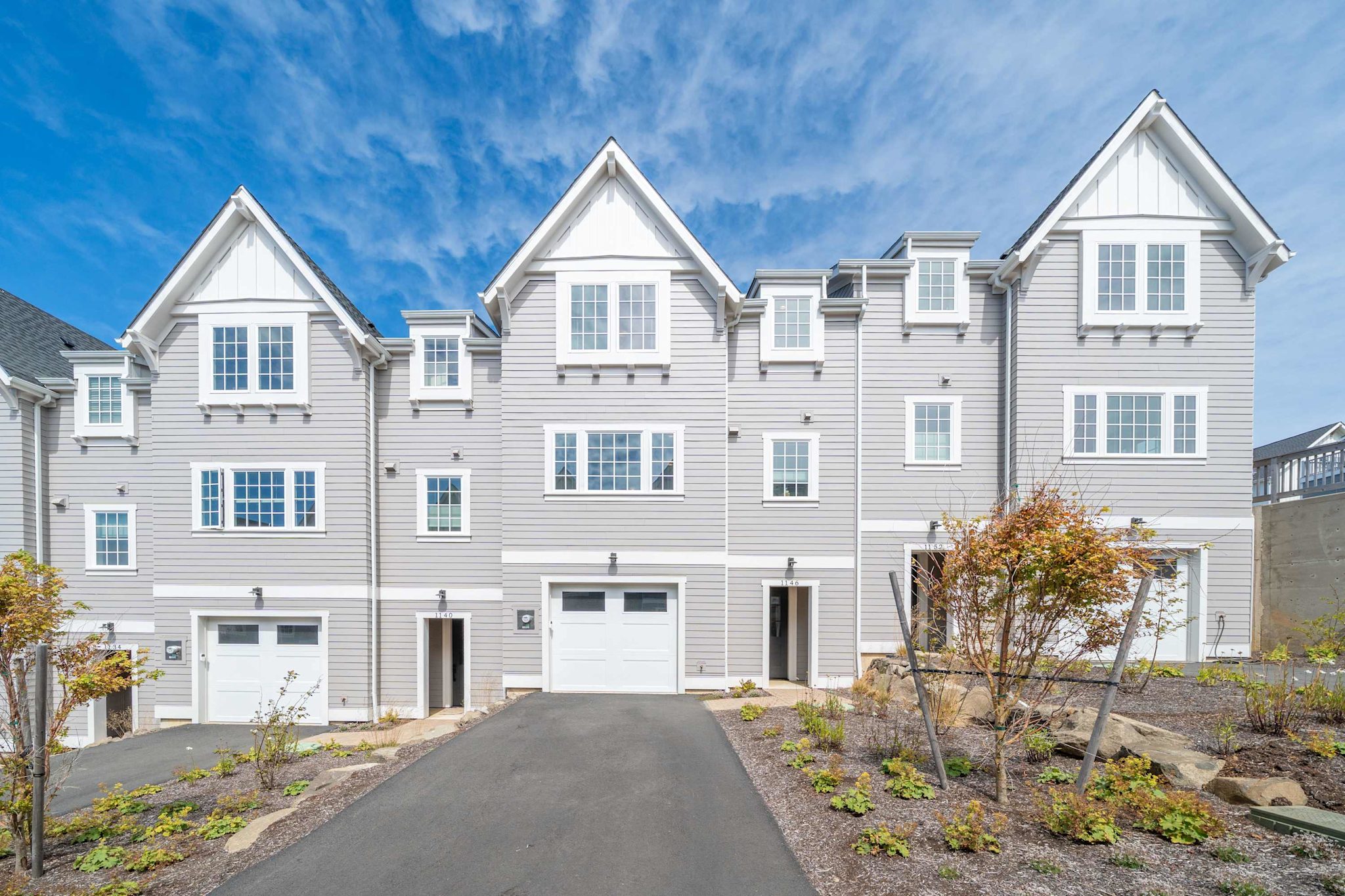 Garage and driveway parking at the townhome