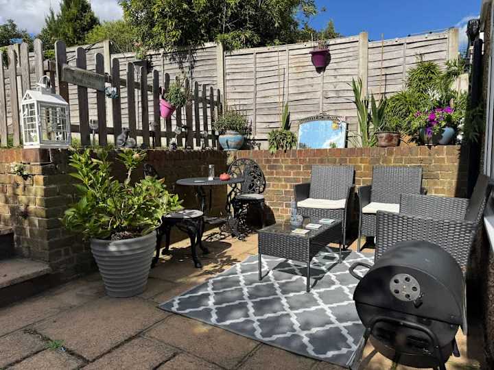 Sunny patio area perfect for entertaining and enjoying the sunshine. BBQ available as shown.