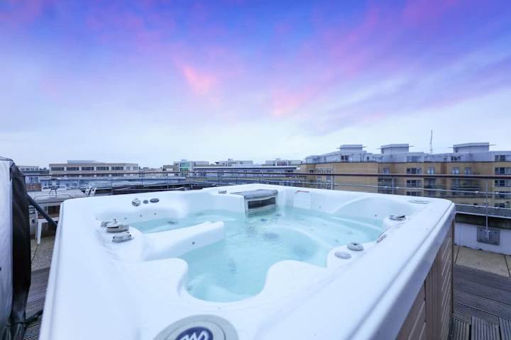 Rooftop jacuzzi for ultimate relaxation.
