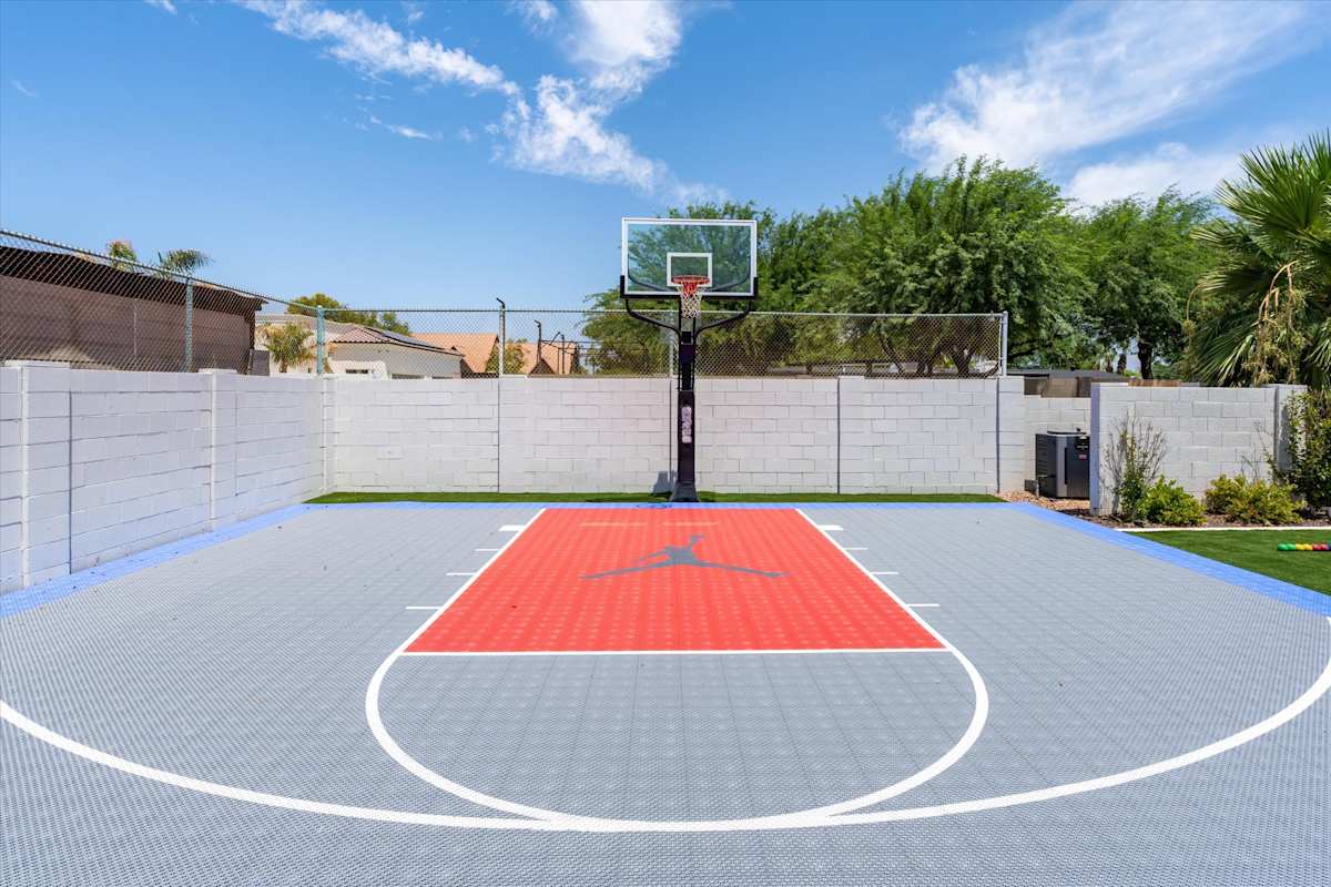 Blue and red basketball half court in daylight — The Scottsdale Social, Scottsdale, Arizona