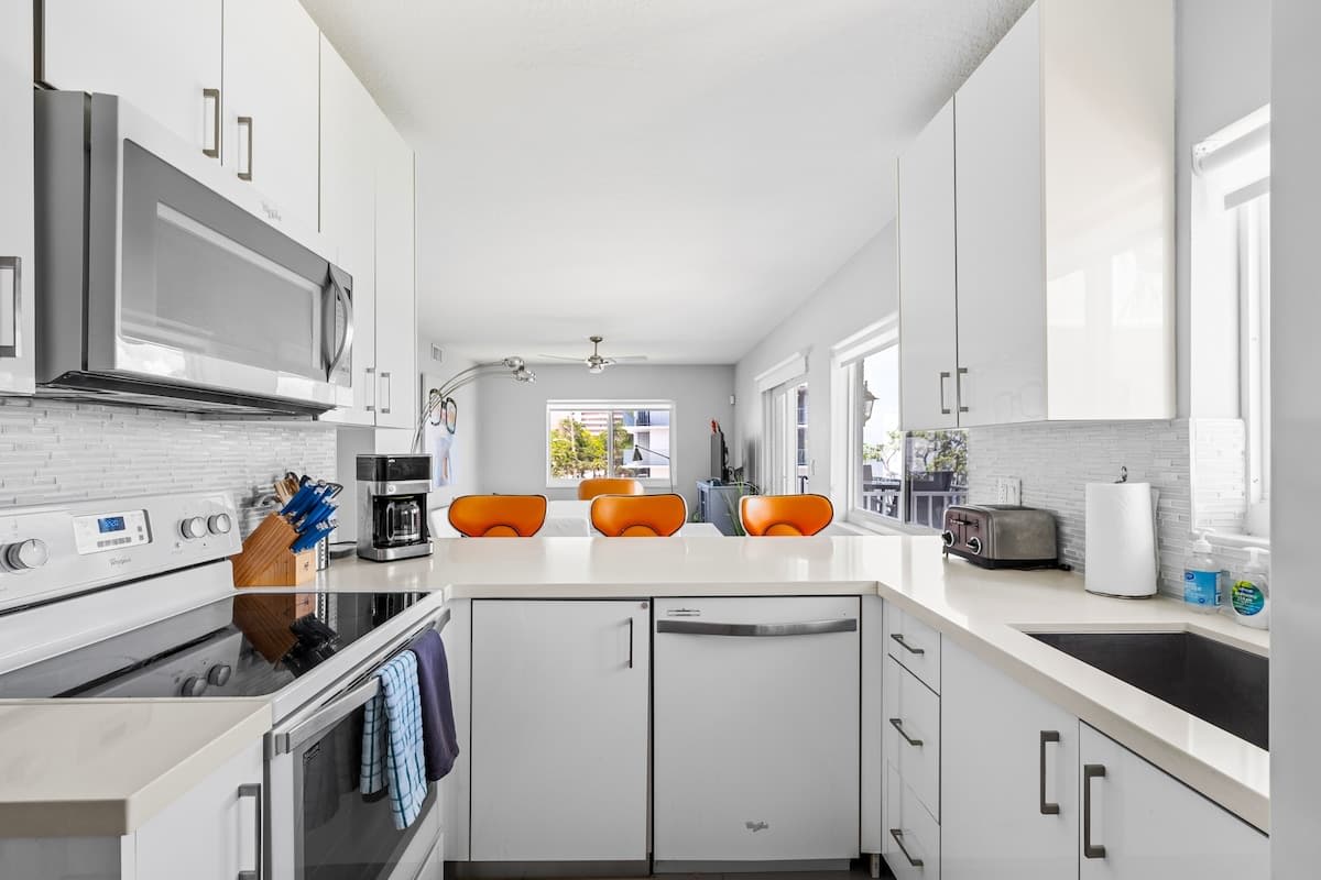 Pompano Condo: Our fully equipped kitchen has everything you need to make delicious home-cooked meals
