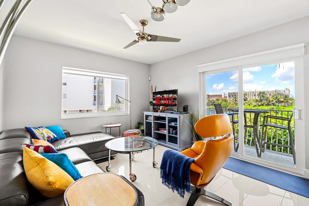 Pompano Condo: The living room connects to a balcony with views of the Intracoastal
