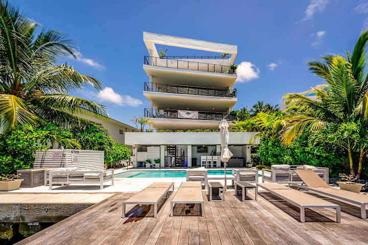 Bayview Villa | Normandy Isles | Waterfront with Outdoor Spaces and Pool Access